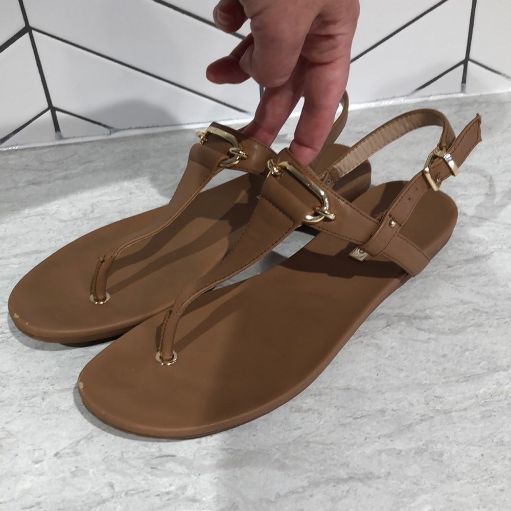 Aldo 8.5 Nude T-strap Flat Sandals with Gold Hardware.